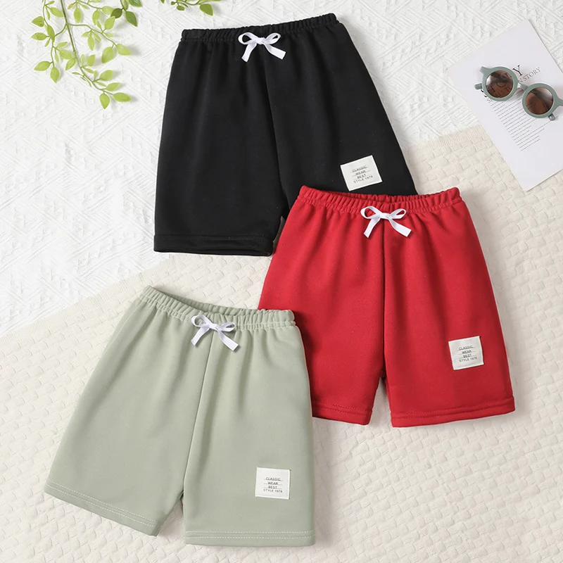 1/3/6 pezzi per bambini estate tinta unita moda pantaloncini casual ragazzi sport selvaggi pantaloni da esterno ragazze pantaloni da spiaggia elasticizzati colorati