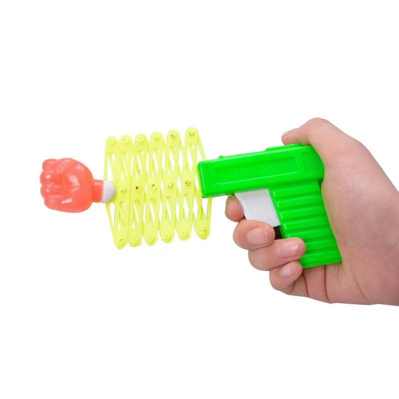 Children's April Fool's Day Prank Novelty Funny Toy Retractable Fist Shooting Skill Gun Decompression Retractable Classic Toy