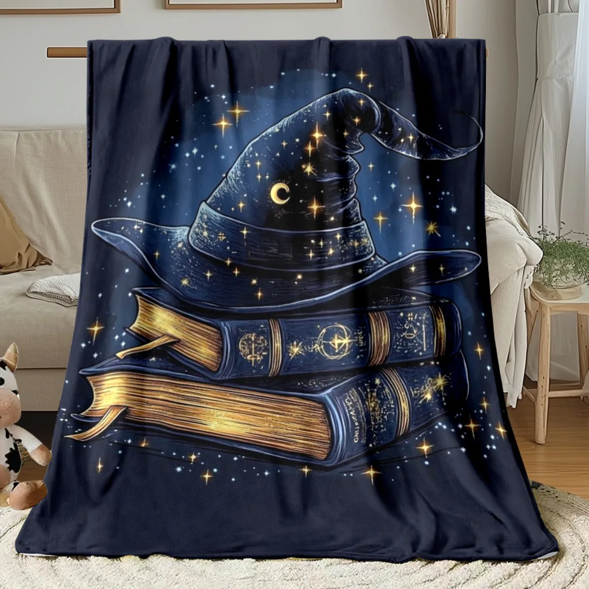 A Single Wizard Hat Along with Books on a Dark Blanket - a Lightweight Flannel Bedding Option Ideal for Sofas, Beds, Travel, Cam