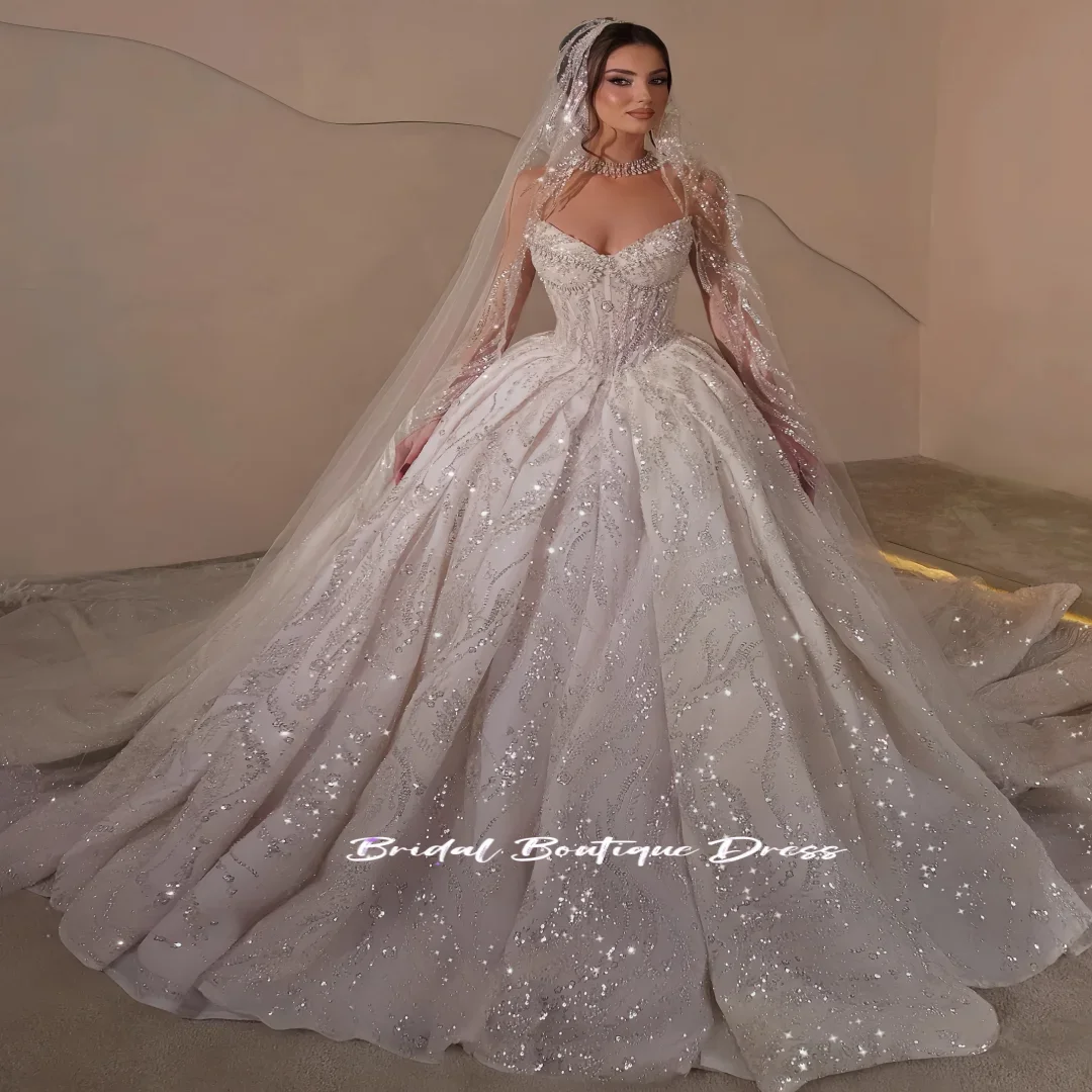 Abiti da sposa di lusso personalizzati Paillettes Perle Abiti da ballo da sposa Senza spalline Senza maniche Abito da sposa principessa Vestido De Noiva