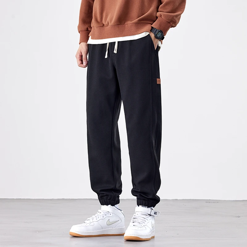 New Autumn Men's Wafer Grid Cuff Baggy Casual Pants with Fashionable Design