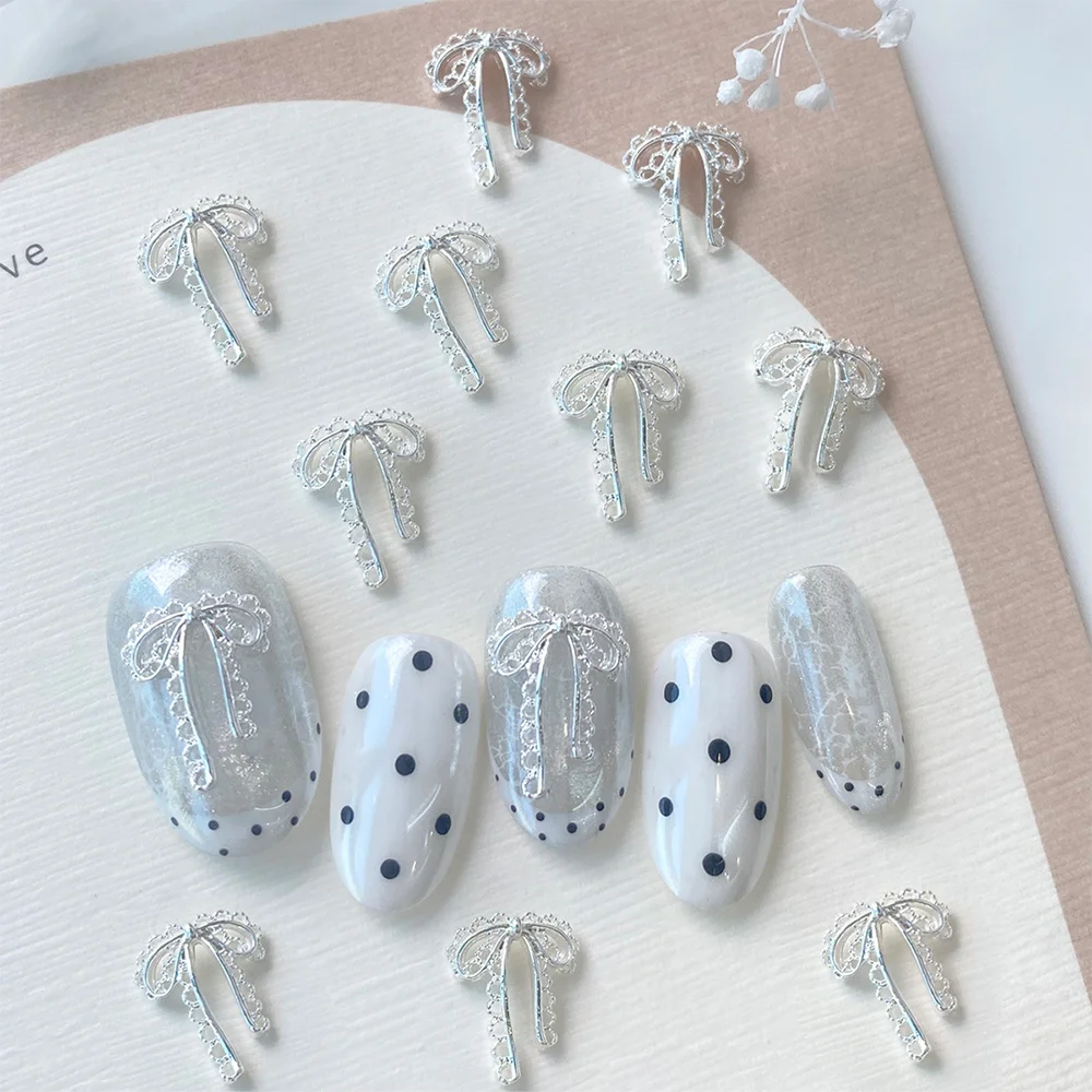 20 pièces de décorations pour ongles en alliage, nœuds en ruban à bordure dentelle or et argent, breloques pour ongles, styles français élégants pour manucures
