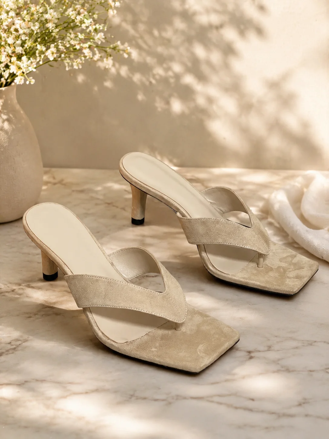 Flip flops, high-heeled sandals, and sandals