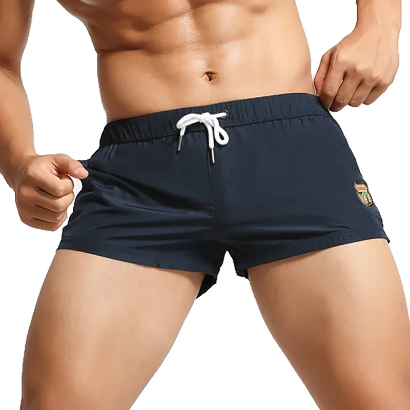 Men Casual Shorts Casual Pocket Mesh Mini Boxer Shorts Summer Sports Gym Fitness Workout Sweatpant Beach Shorts Trunks Briefs