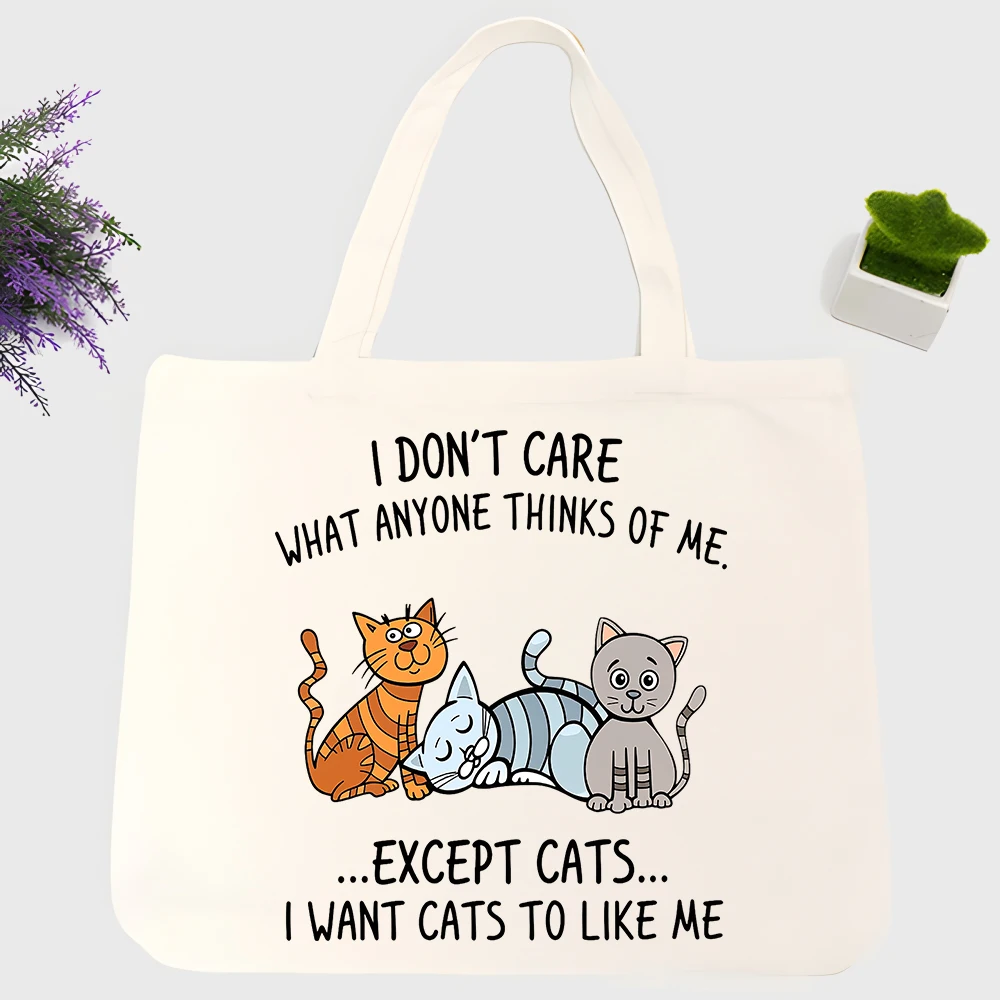 Women's cat graphic canvas tote bag with slogan print, casual style for daily shopping and outdoor outings