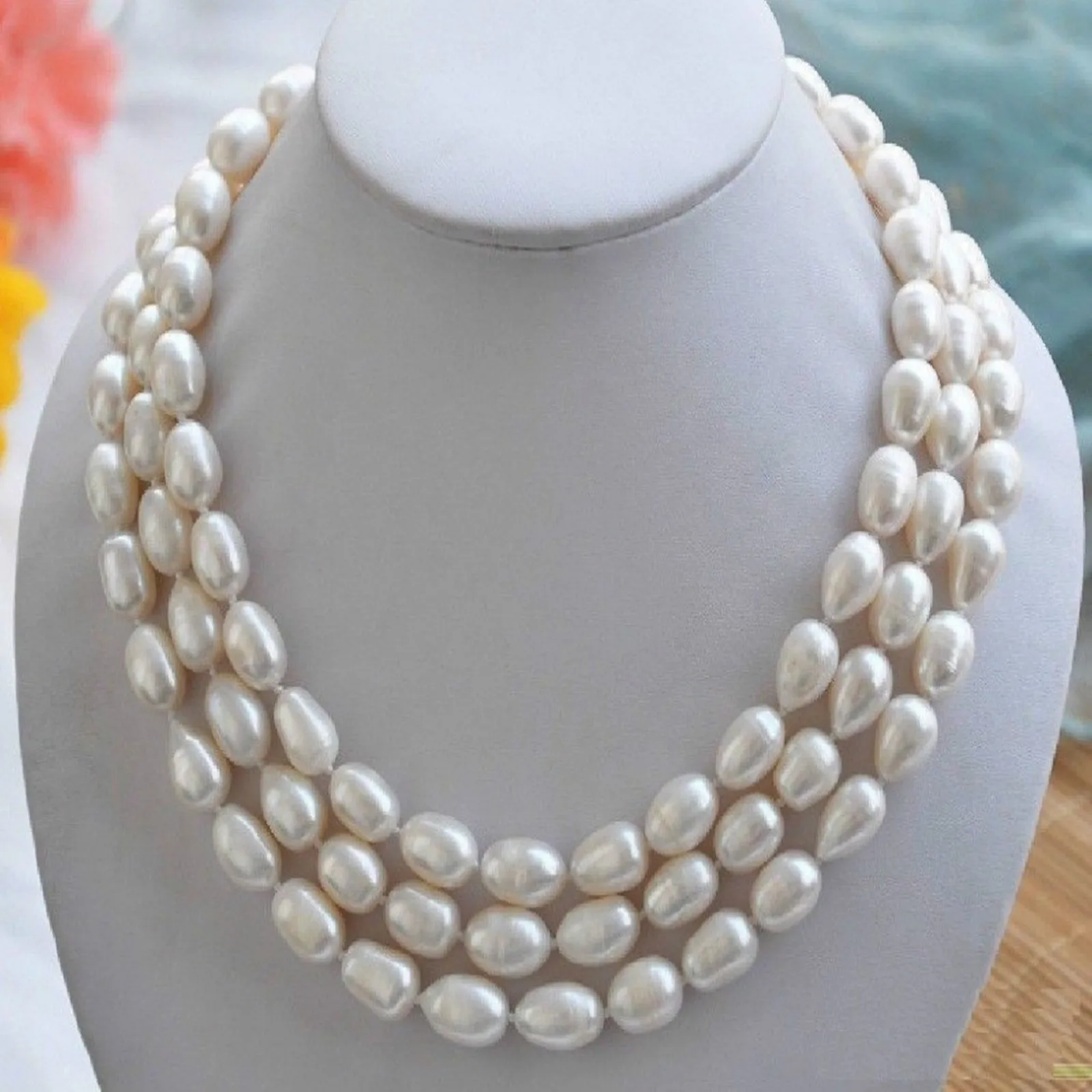 

Hand knotted necklace natural 8-9mm white freshwater rice pearl sweater chain nearly oval pearl 48inch