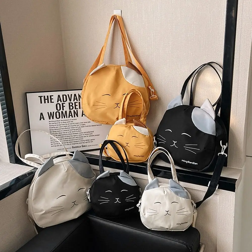 Casual canvas nylon prints kat messenger bag grote capaciteit college stijl handtas schoudertas draagbare crossbody tas meisje