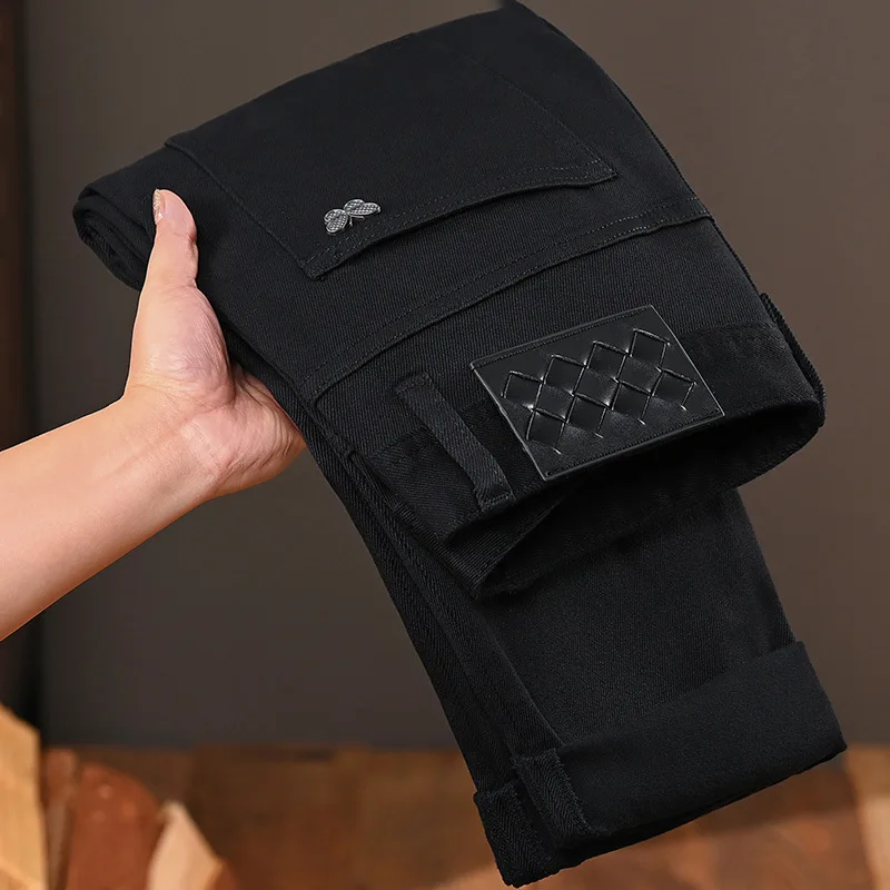 Pure black jeans men's 2025 new light luxury fashion spring and summer versatile elastic slim fit small straight leg pants