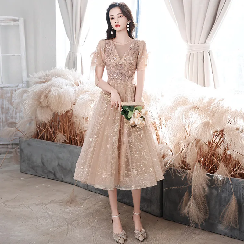 

Champagne Sequins Evening Dress Fashion O-Neck Empire Short Sleeves Tea-Length Pleat A-Line New Woman Formal Party Gown A2490