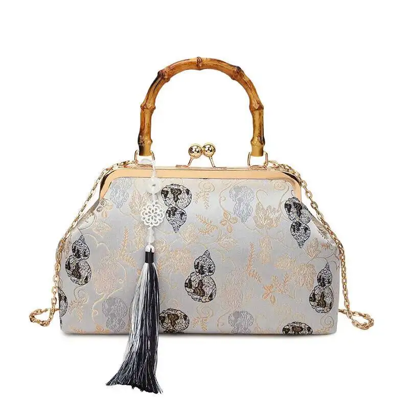 

Винтажная женская сумка-тоут в китайском стиле с жаккардовым узором «Тыква», бамбуковой ручкой, металлической застежкой, бахромой и подвеской, для вечернего образа, в стиле чонсам