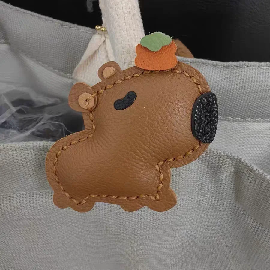 

Light Luxury Fashion Capybara Pendant Niche Brand Design Bag Pendant New Style Persimmon Head Cute Capybara Auspicious Accessory