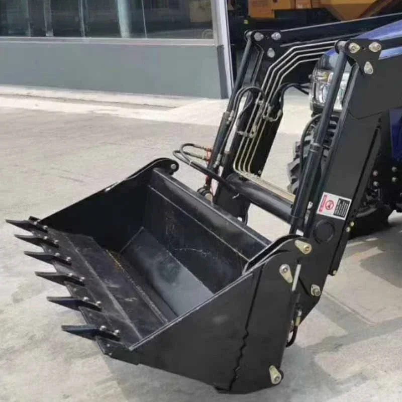 Loader bucket installed in front of tractor