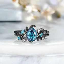 European and American new water droplet shaped blue topaz inlaid jewelry fashionable black gun color women's double-layer ring