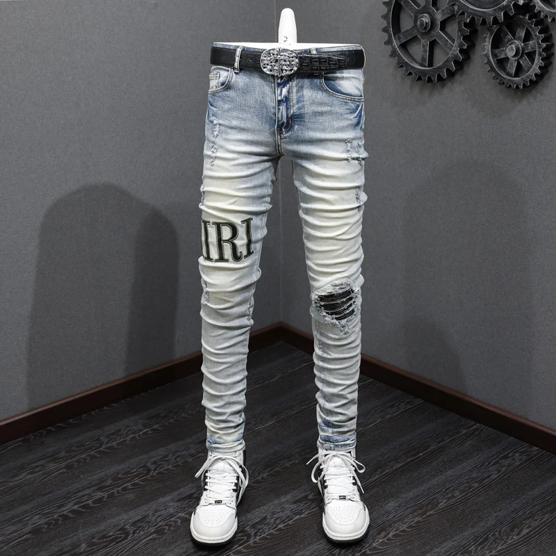 

Fashionable new men's jeans stretch slim fit perforated patch retro blue jeans designer high street hip-hop brand pants hombre