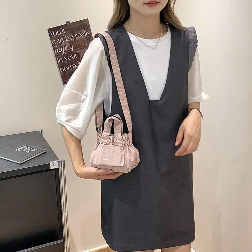

Sweet Korean Style Nylon Shoulder Bag Crossbody Bag Lightweight Canvas Messenger Bag Bucket Bag Waterproof Dumpling Bag Girls