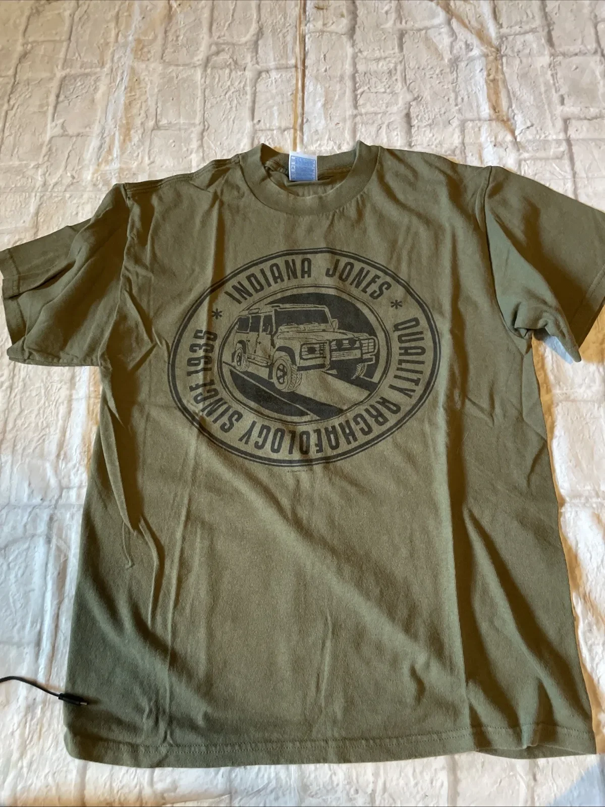 

Indiana Jones Army Green Quality Archeology Since 1935 Tee