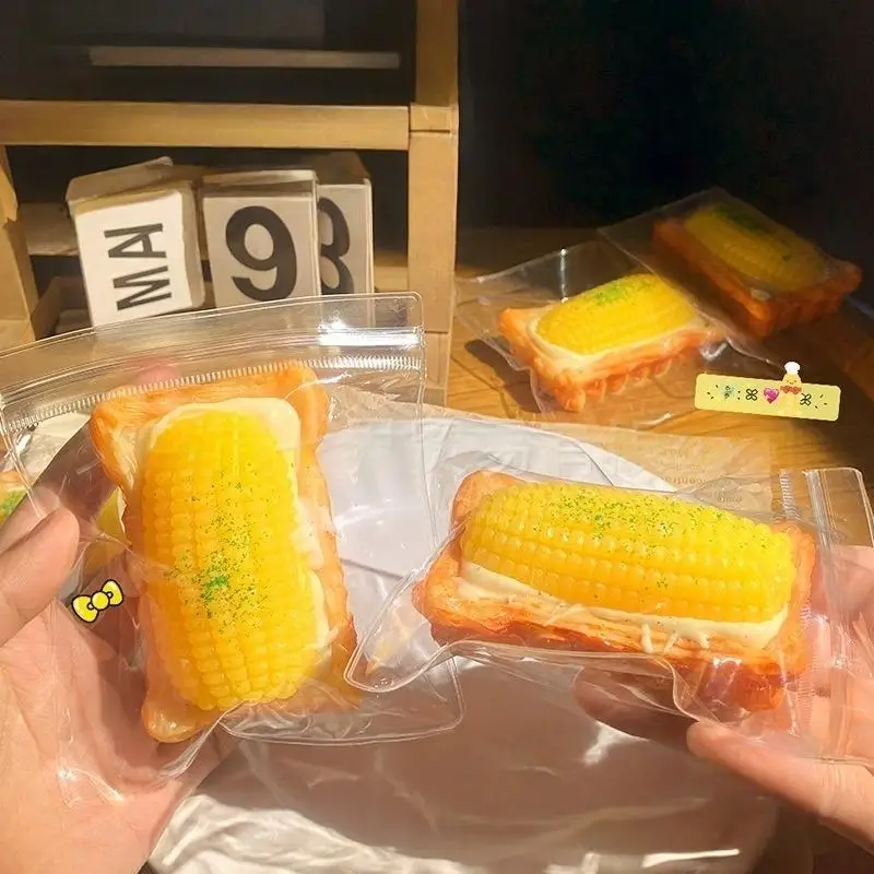 ของเล่นบีบมือทำเองรูปทาร์ตไข่ข้าวโพด 1 ชิ้น เนื้อนุ่มพิเศษ บรรเทาความเครียด ของเล่นบีบยืดหดได้สำหรับเด็ก ของเล่นดนตรีบีบอาหาร