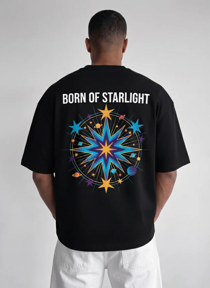 

Black Graphic Tee Born of Starlight Back Print Cosmic Starburst with Planets and Retro Compass Star Printed Tee Casual Wear
