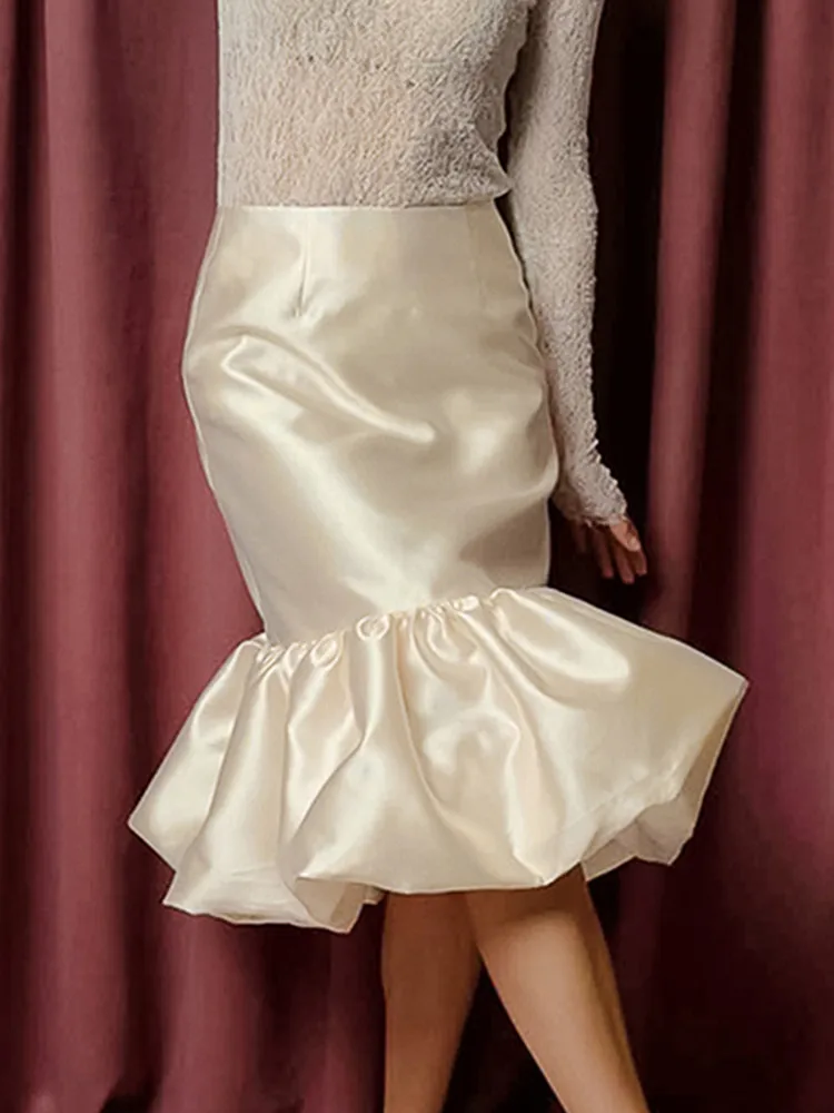 

BKLD Autumn Hip Hugging High Waisted French Style Skirts 2025 New Women Clothing Solid Color Satin Patchwork Puffy Skirts
