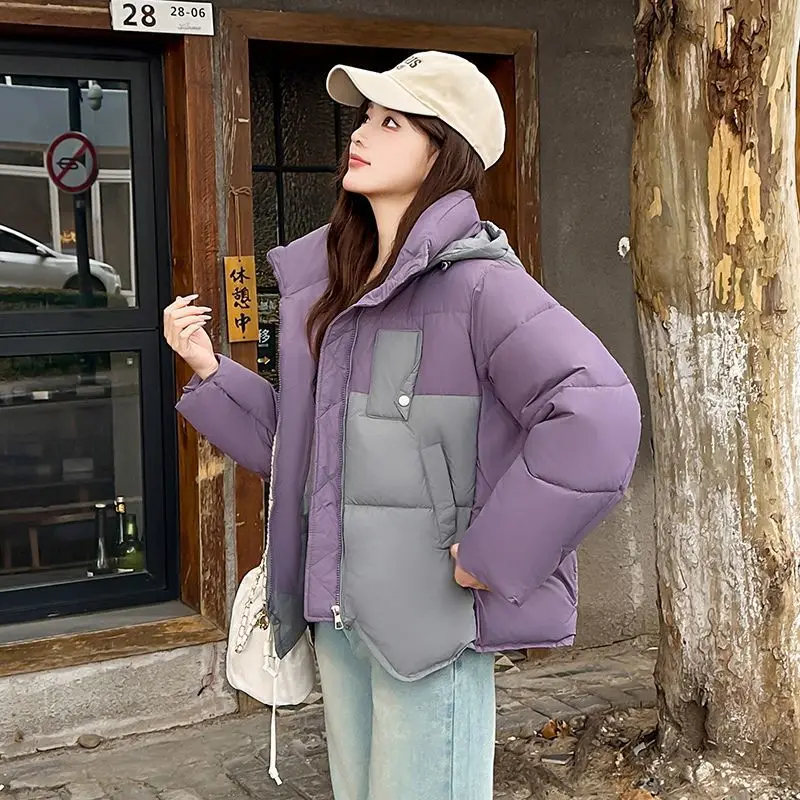 La giacca invernale imbottita in cotone da donna in stile college dopamina multicolore è alla moda, individualizzante, carina ed elegante