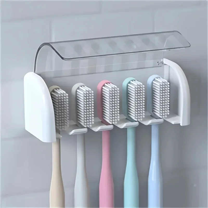 

A covered 5-slot toothbrush holder, self-adhesive wall toothbrush storage rack, plastic bathroom supplies
