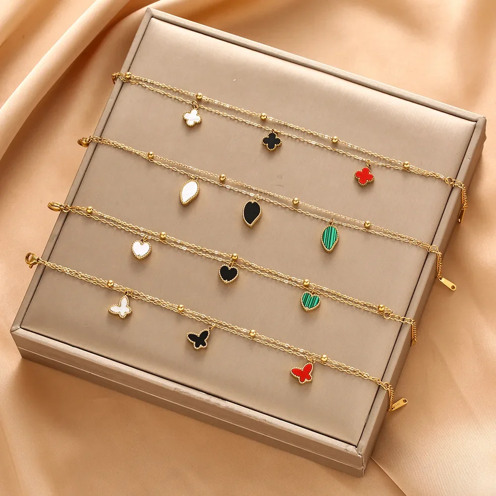 

Butterfly Four-leaf Clover heart-shaped titanium steel bracelet, light luxury and high-end