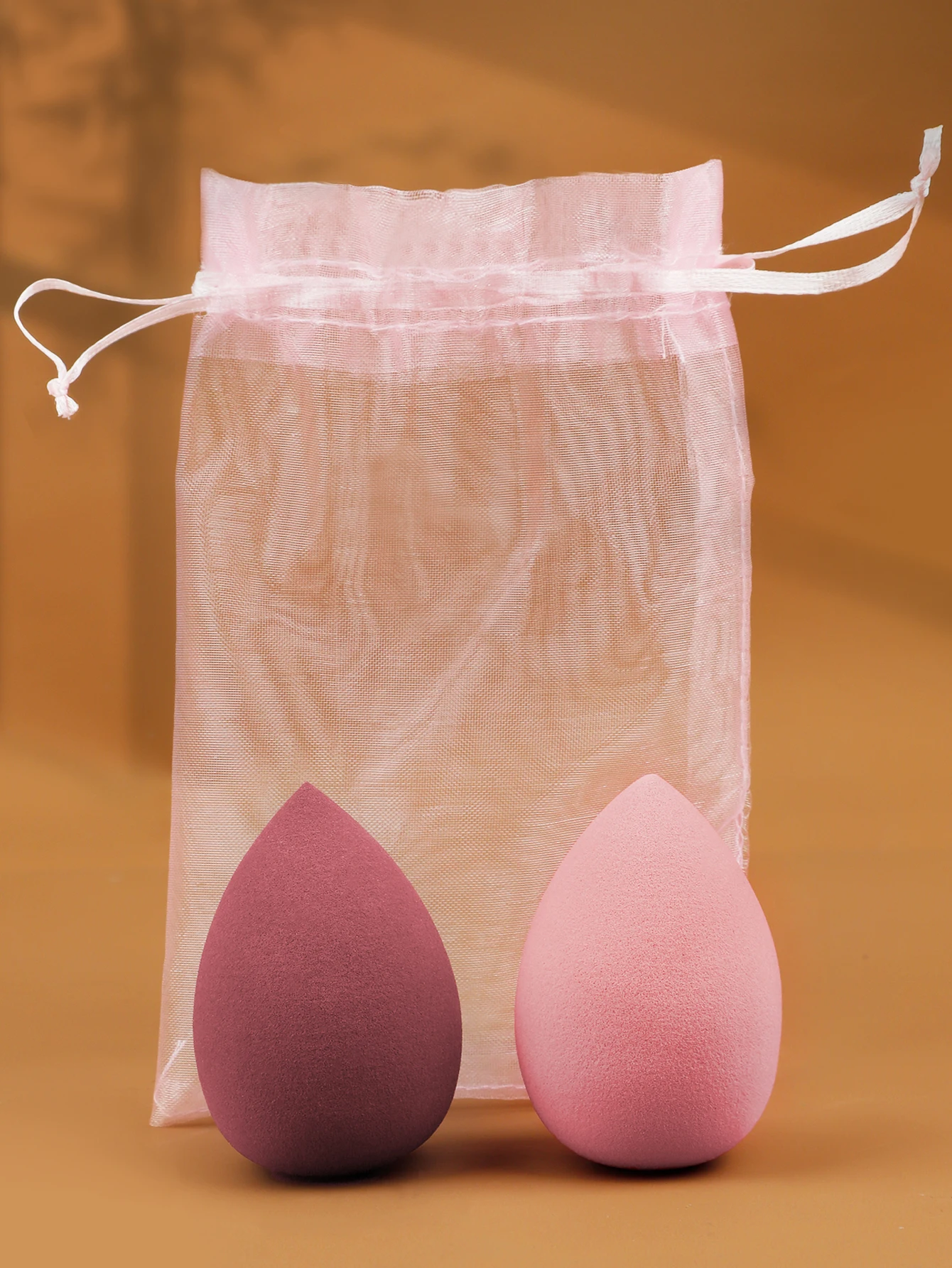 2-Pack Water-Activated Beauty Sponges That Expand in Water Without Absorbing Powder + Convenient Storage Mesh Bag