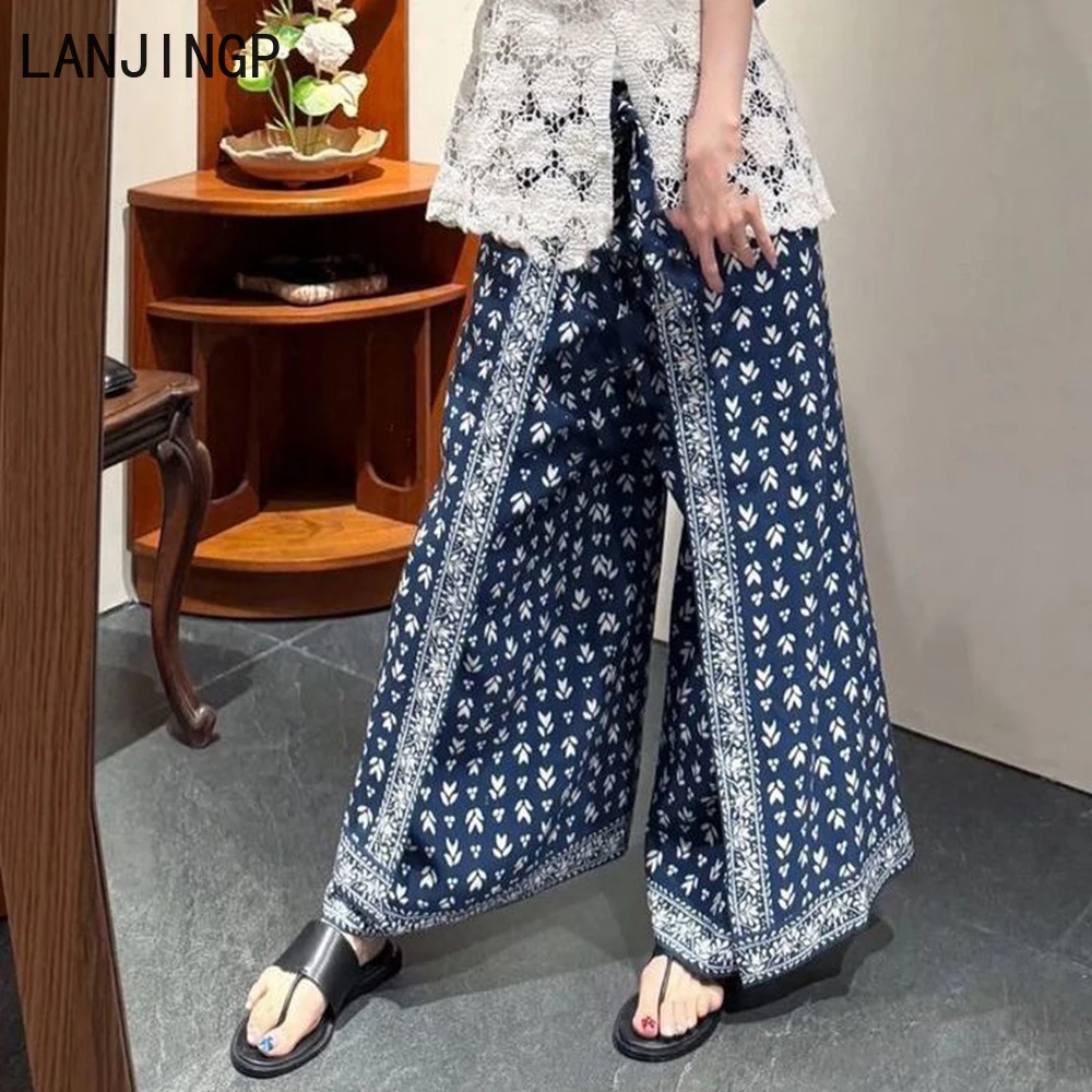 Large size Korean unique and beautiful retro printing wide-leg pants skirt, new splicing, thin and relaxed