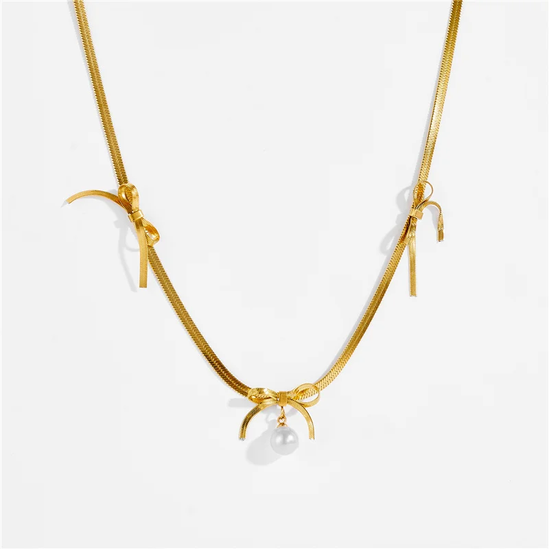 طقم مجوهرات على شكل فيونكة عتيقة من الفولاذ المقاوم للصدأ وقلادة وأقراط من اللؤلؤ، طراز أنيق متعدد الاستخدامات، عصري للنساء