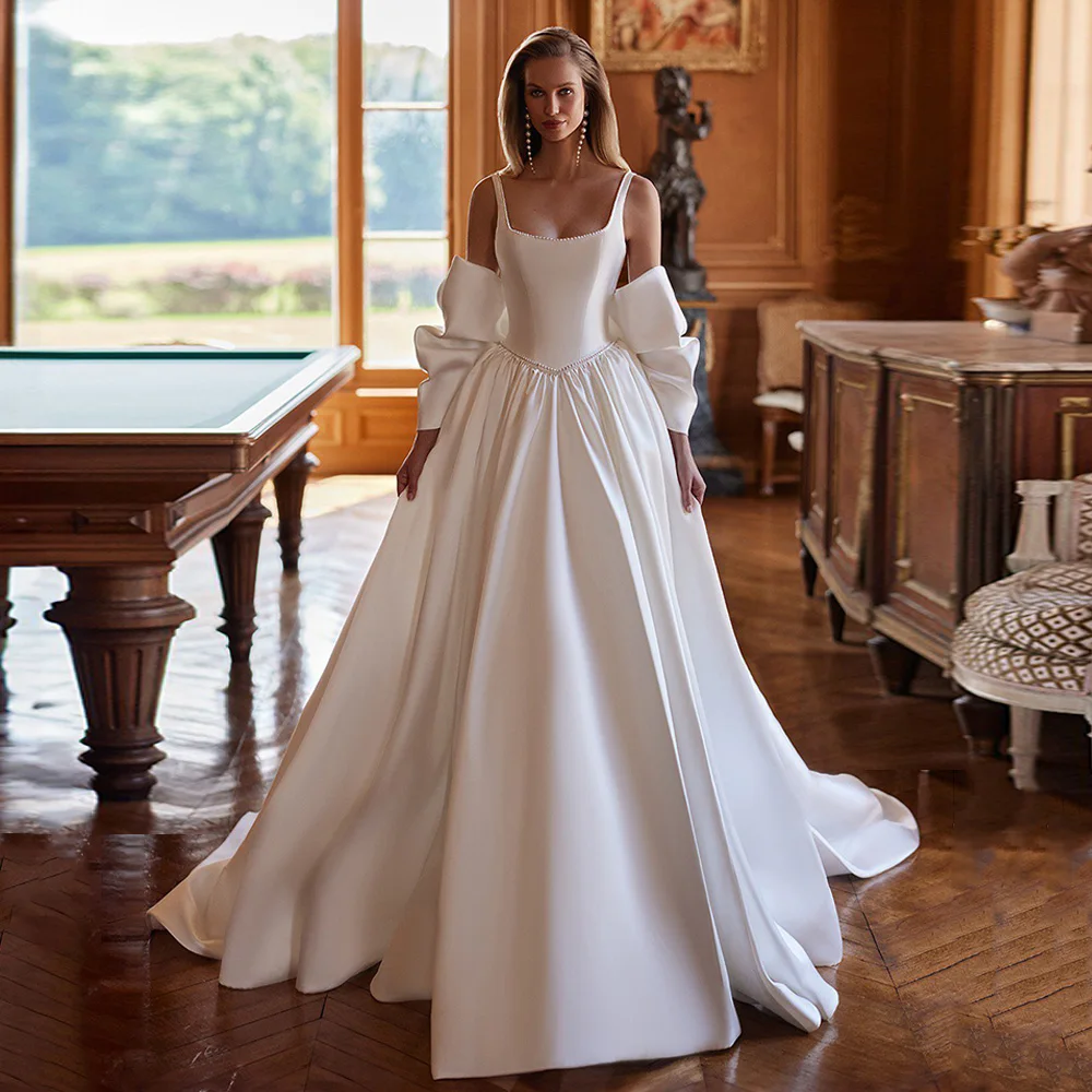 Abito da sposa moderno Robe De Mariee Collo quadrato senza maniche aperto sul retro Perle A Line Corte dei treni Abito da sposa in raso Taglia personalizzata