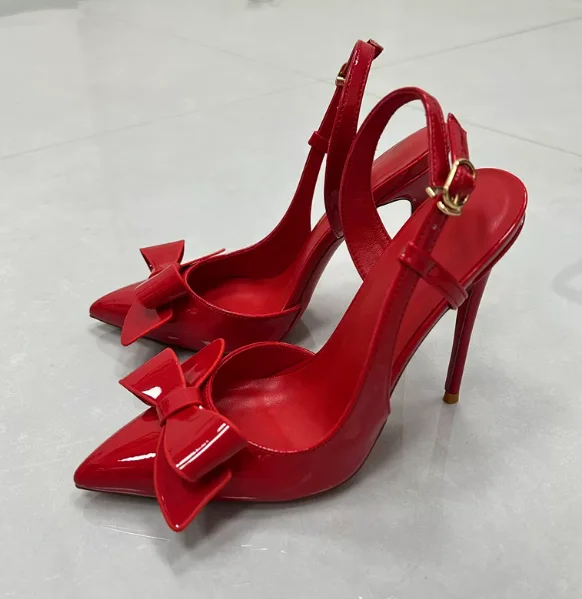 New red bow high-heeled shoes with elegant side space, sexy and stunning banquet dress, shallow mouth