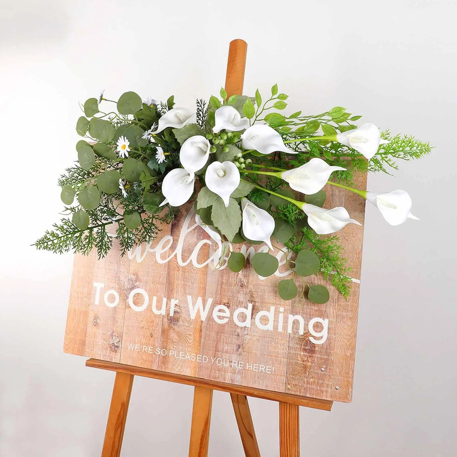 

Искусственные цветы для свадебной арки: каллы, лилии, зелень, листья для декора столов