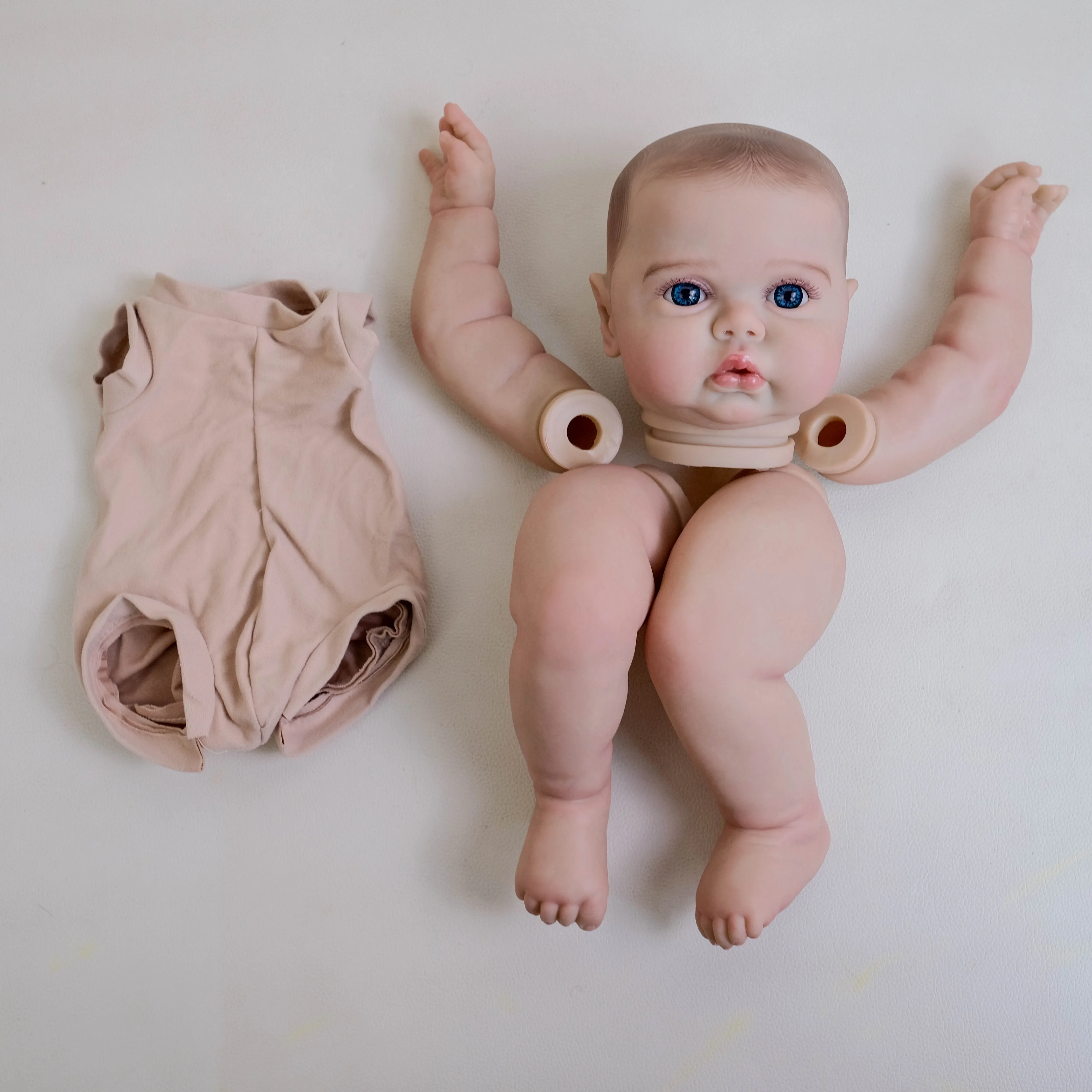 EGO – Kit de cornichon éveillé de 19 pouces, Kit de taille de poupée bébé Reborn déjà peint, réaliste, doux au toucher, cheveux courts blonds, pièces de poupée à monter soi-même