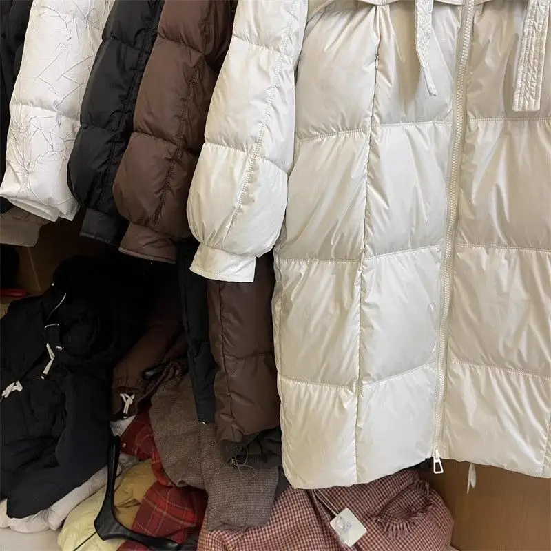 Damska zimowa kurtka z czystej bawełny, długa do kolan, ocieplana, w stylu koreańskim, z kapturem, elegancka, niszowa kurtka watowana.