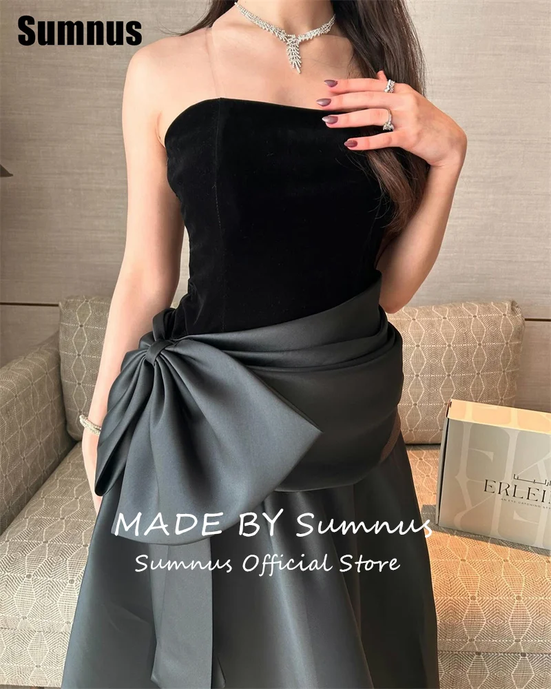 فستان Sumnus الحديث على شكل حرف a للحفلات الراقصة بدون حمالات أسود بدون أكمام طيات فيونكة فساتين رسمية طول الأرض فستان سهرة 2025 مخصص