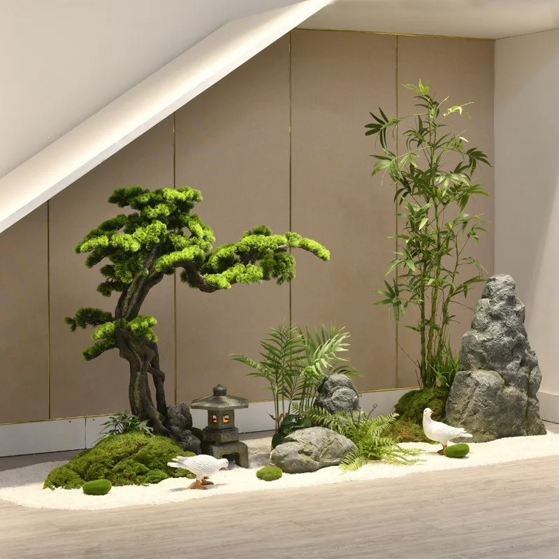 Simulated welcome pine landscape under the stairs Hotel villa under the stairs Rockery stone green plants Chinese landscaping In