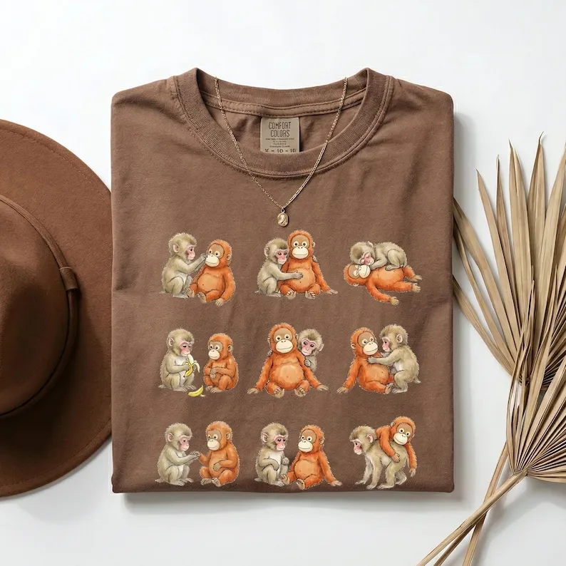 Punch Monkey Shirt Baby Monkey Holding Plush Toy Tee