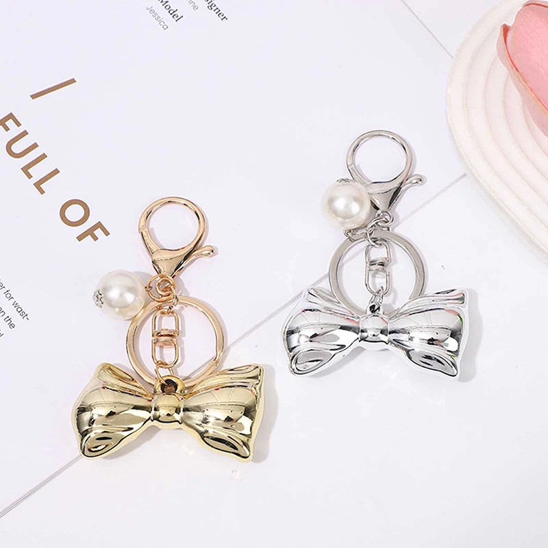 Big Pearl Bowknot Chaveiro para mulheres e meninas, pingente de telefone, fone de ouvido caso charme, decoração do saco, chaveiro do carro