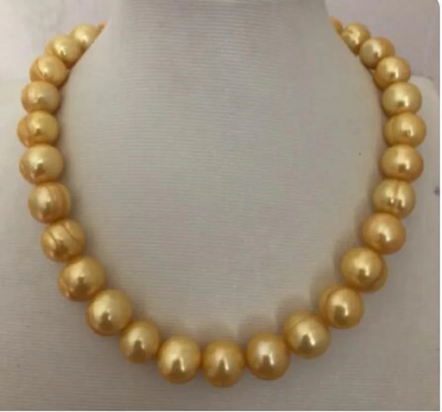 

Huge South Baroque 11-12mm Aaa yellow pearl made of 14K pure gold.