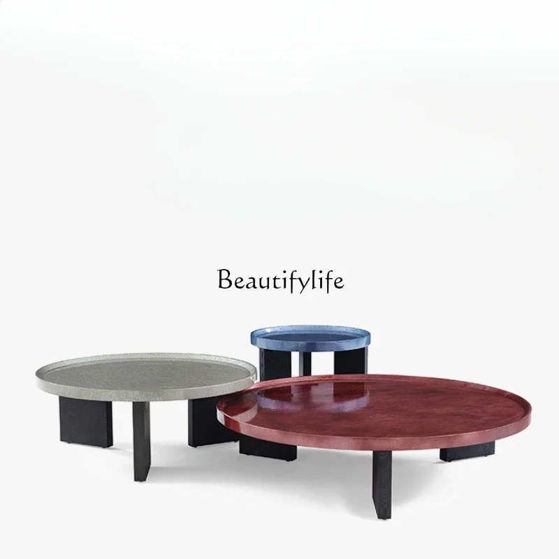 Modern simple high-end combination household coffee table water ripple paint surface elm grain tripod