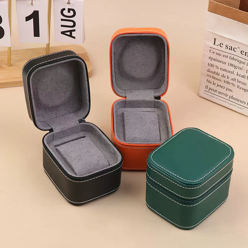 กล่องใส่นาฬิกาหนัง PU คุณภาพสูง สำหรับนาฬิกาข้อมือแบบพกพา ดีไซน์ทันสมัย พร้อมซิป สำหรับเก็บนาฬิกาเดี่ยว