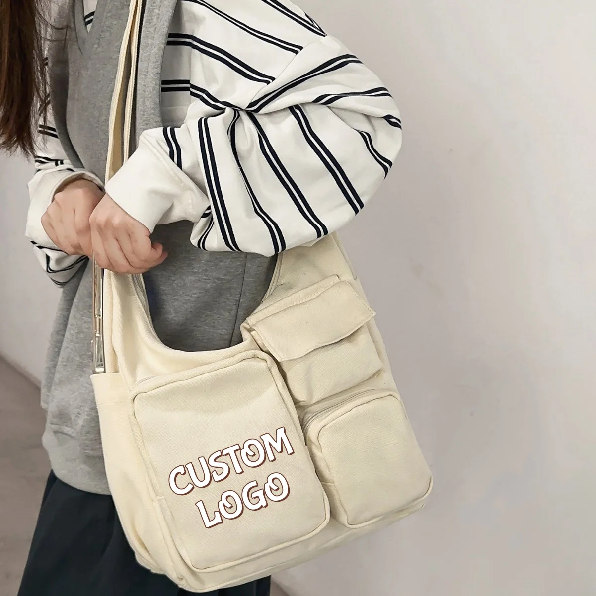 

Custom Logo Multi Pocket Canvas Tote Bag Large Capacity Student Shoulder Bag Adjustable Strap Daily Commute Crossbody Bag
