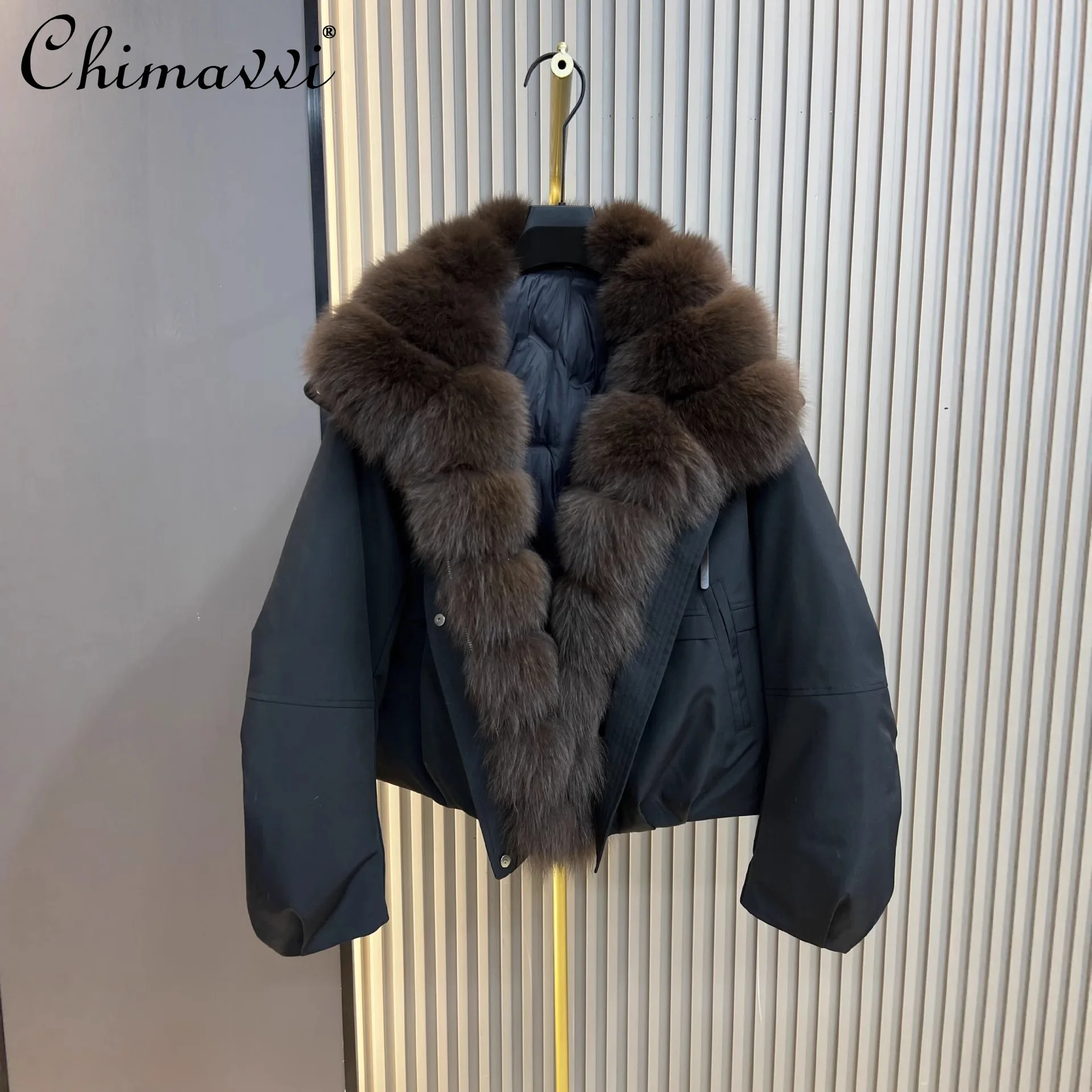 Piumino d'oca pesante Collo in pelliccia di volpe 2025 Inverno Nuova moda Manica lunga Allentato Caldo Elegante Parka da donna Cappotto in pelliccia sintetica