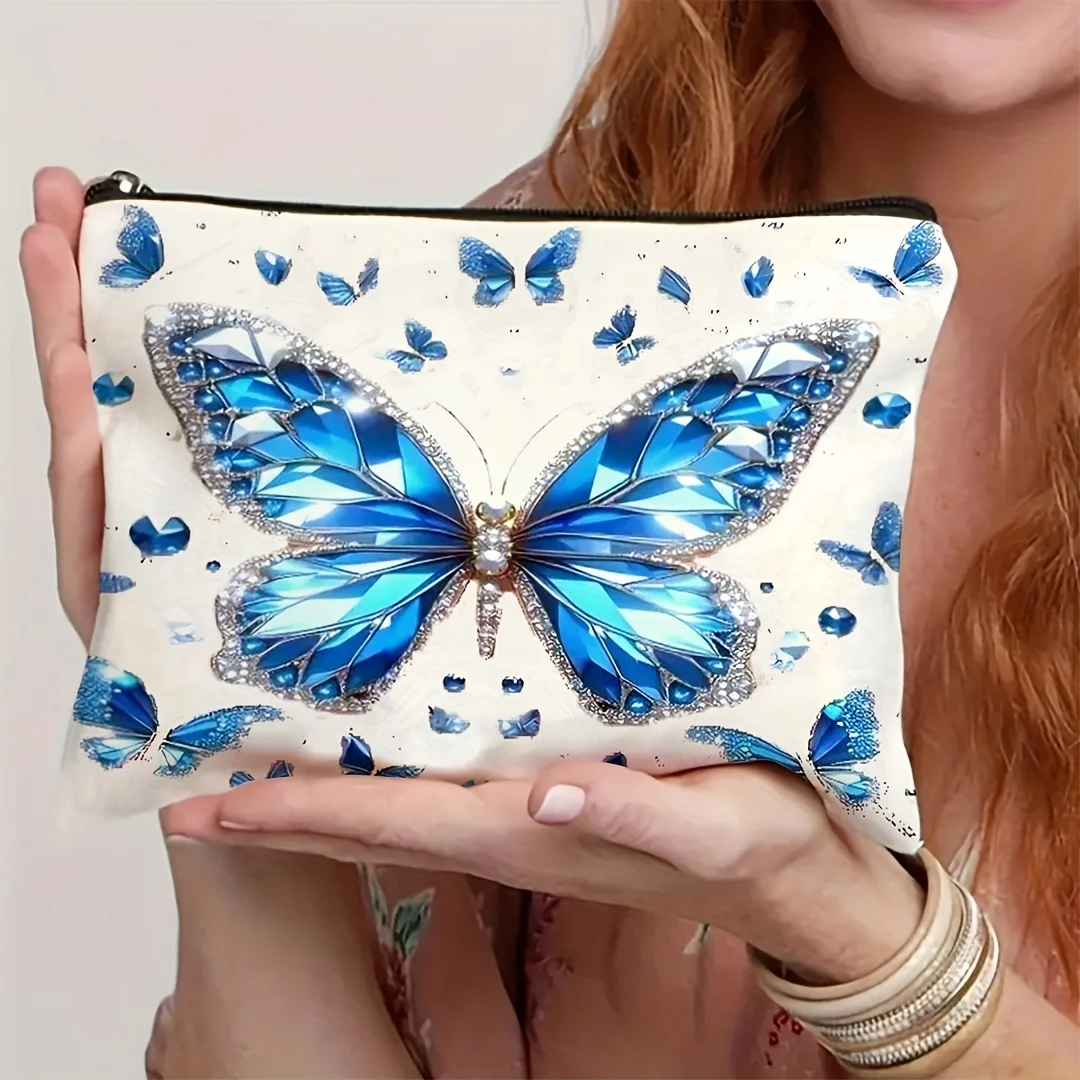 Un sac de maquillage papillon bleu – Sac à fermeture éclair multifonctionnel mignon pour femmes, sac de rangement de bijoux