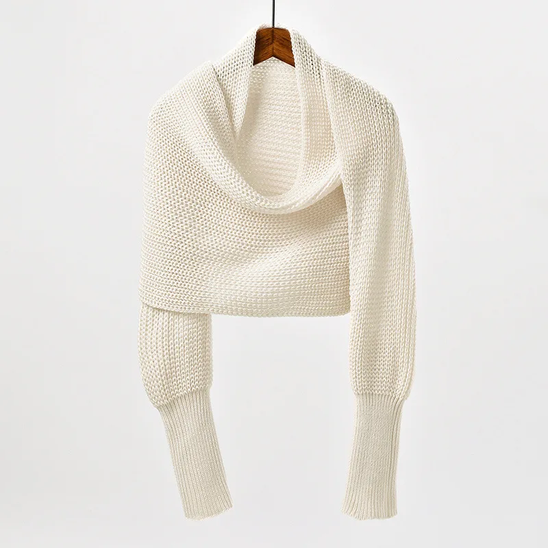 ผ้าคลุมไหล่สีพื้น สไตล์ฤดูใบไม้ร่วงใหม่ แขนเสื้อทรงครอสแบทวิงแบบไม่สมมาตร เสื้อคลุมทับด้วยเสื้อสเวตเตอร์ถักแบบลำลอง แบบสั้นๆ.