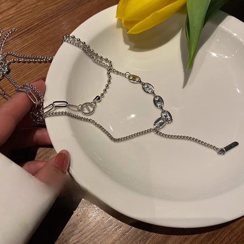 سترة من النوع الثقيل ذات سلسلة شرابة فاخرة وخفيفة الوزن بتصميم نسائي وإكسسوارات سلسلة الترقوة بمزاج بسيط