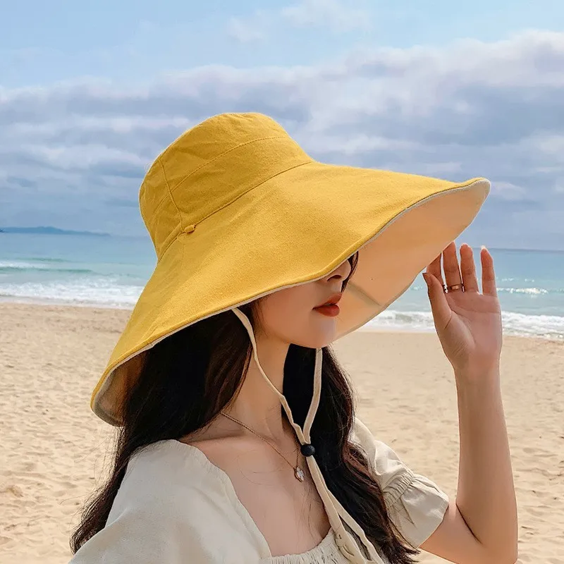 A versatile hat for women wide-brimmed fisherman's covering the face and