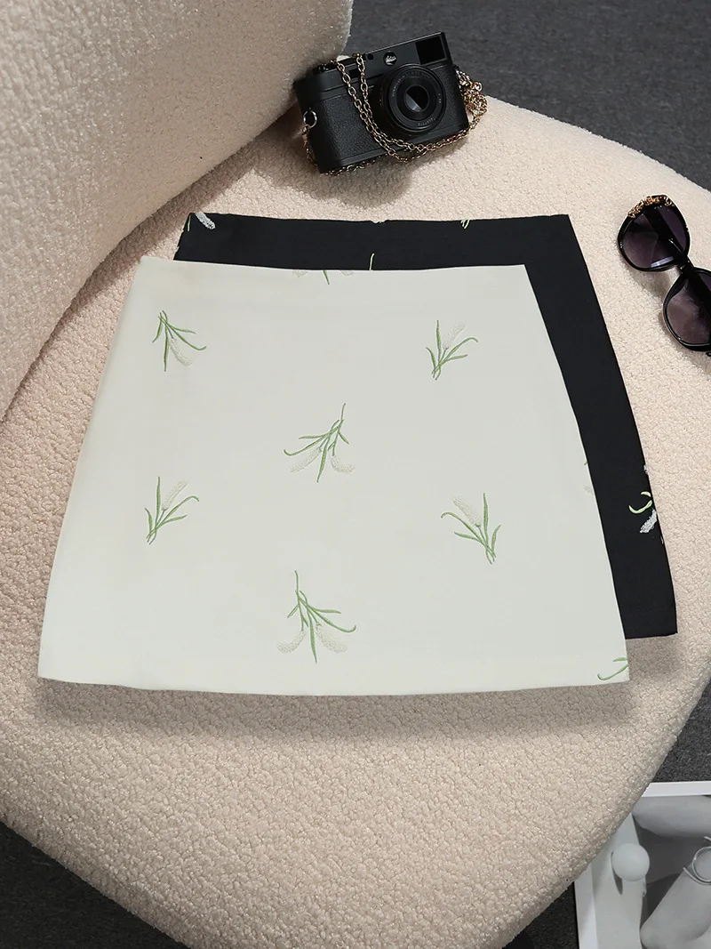 Neue Frühjahr/Sommer-Mode, lässig, hohe Taille, Retro-Stil, bestickt, Reißverschluss, schmale Passform, über dem Knie, Minirock, 2 Farben