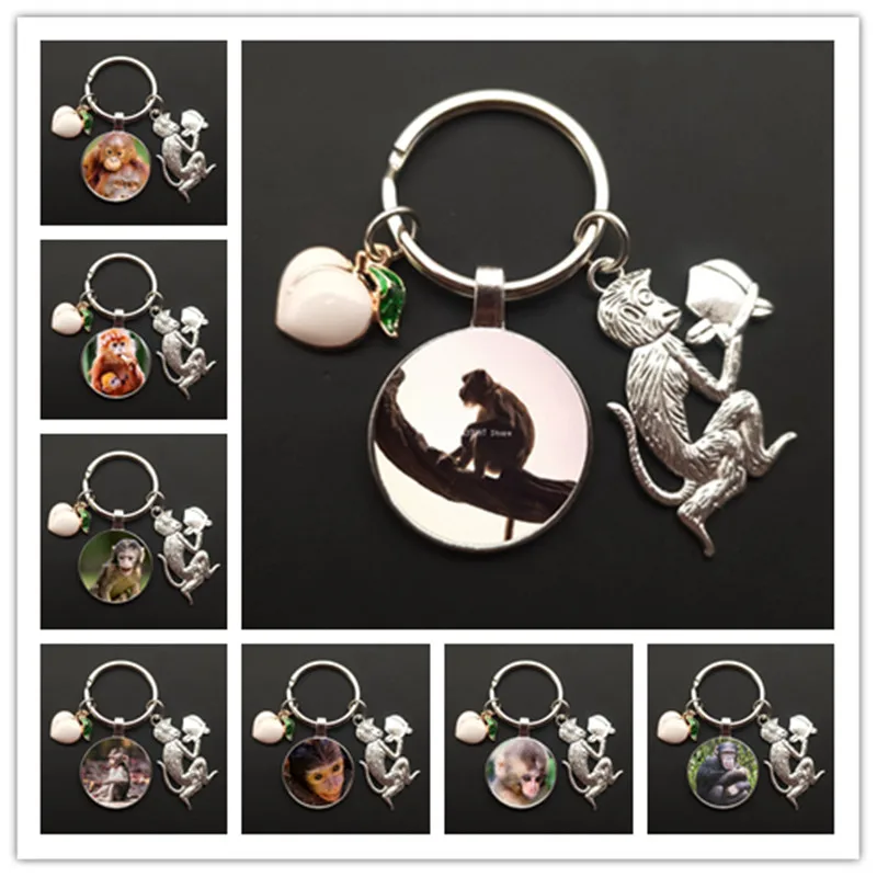 Monkey charm keychain monkey painted glass cabochon car bag ornaments peach keychain men and women souvenirs