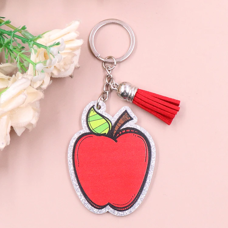 القهوة المثلجة كتاب عاشق العصرية هدية عيد المعلم الشريط الوعي بريق التفاح سلسلة مفاتيح مصنوعة من الأكريليك مع شرابة